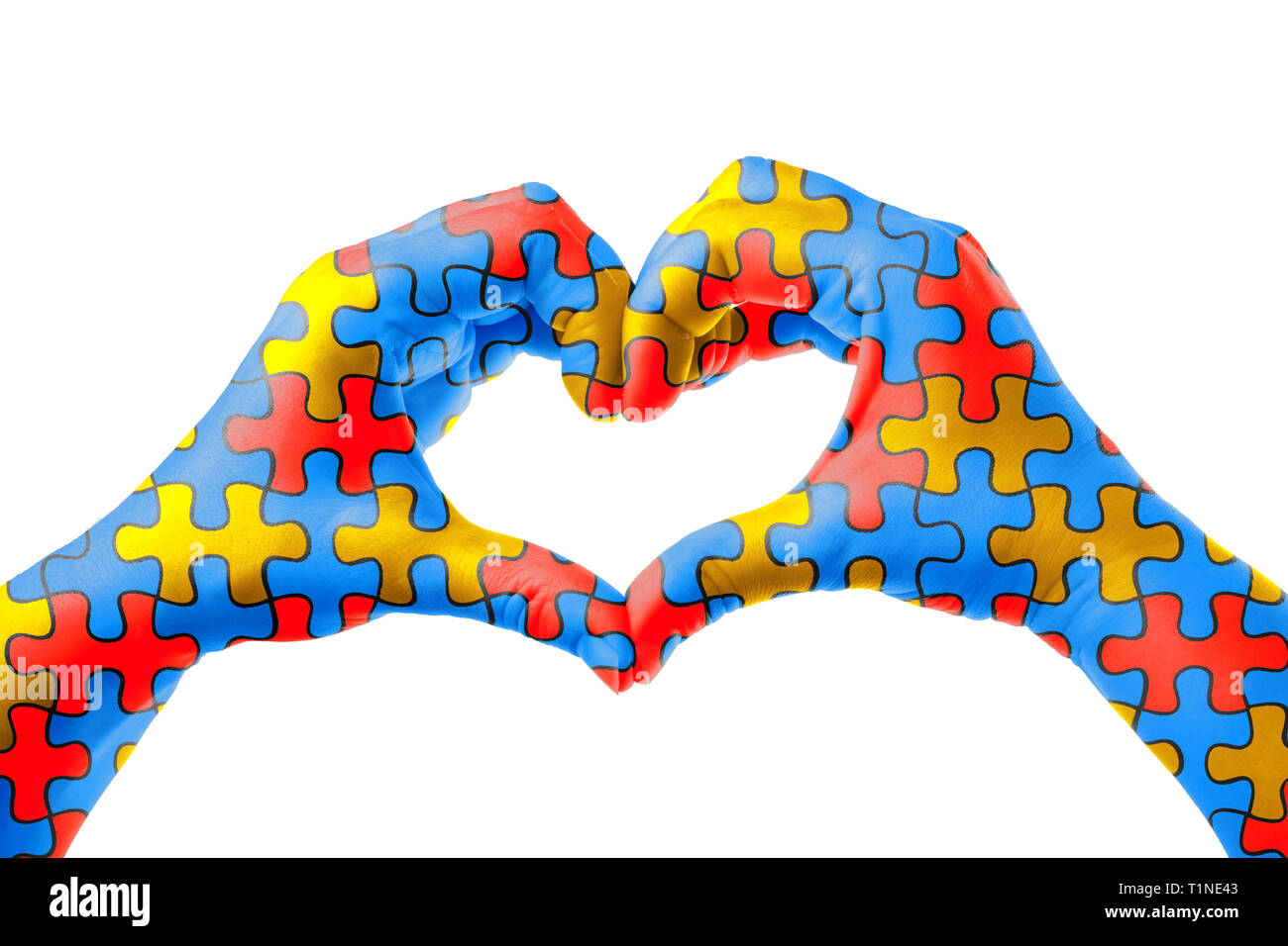 Mondo autismo giornata di sensibilizzazione, assistenza in materia di salute mentale concetto con puzzle jigsaw pattern a forma di cuore le mani. Foto Stock