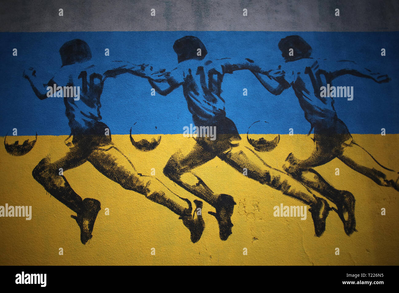 Buenos Aires, Argentina - 30 Marzo 2019: Diego Armando Maradona muro di graffiti impressione a un isolato di distanza da La bombonera stadium di La Boca, Buenos Foto Stock