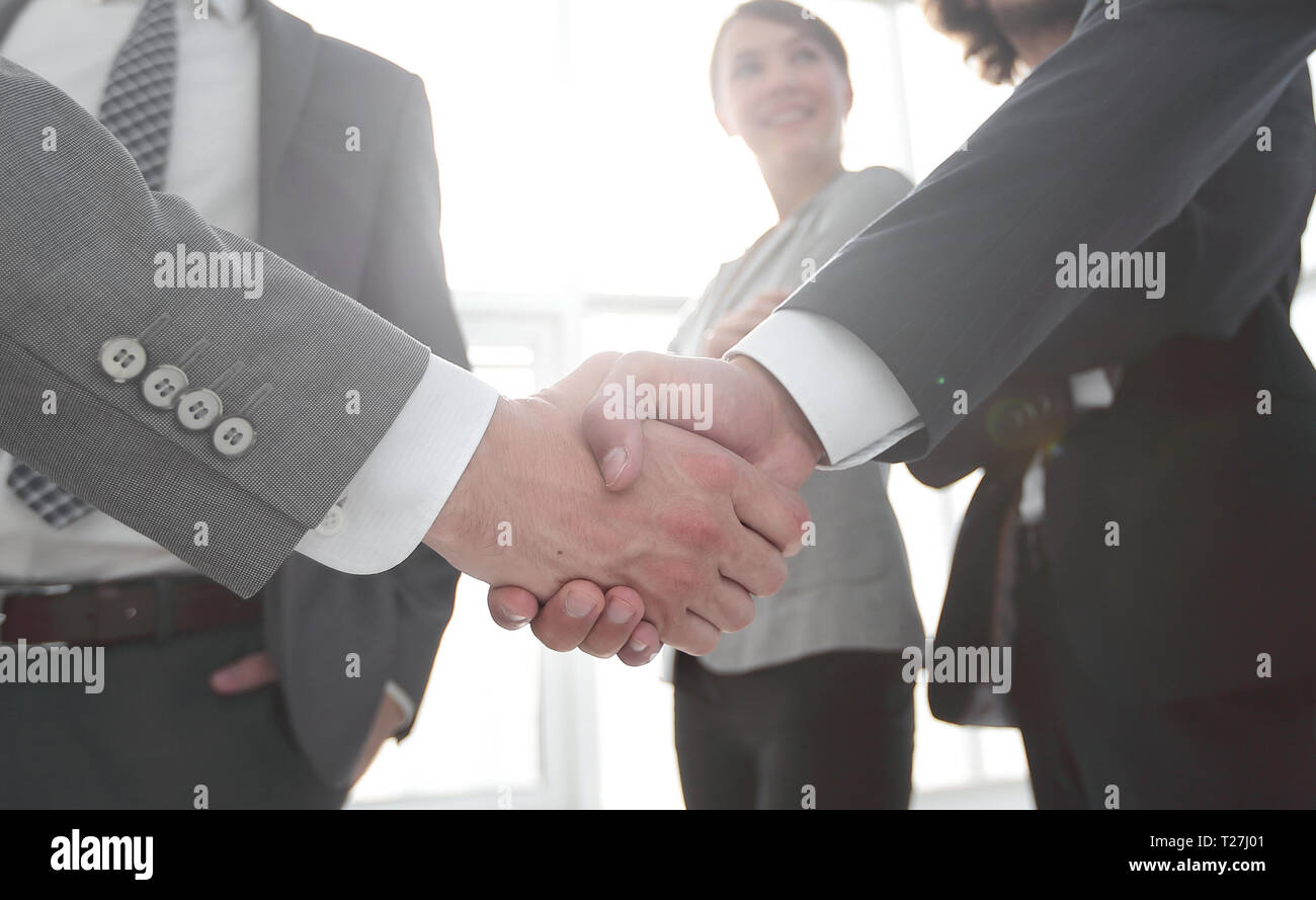 Il concetto di business business handshake persone Foto Stock