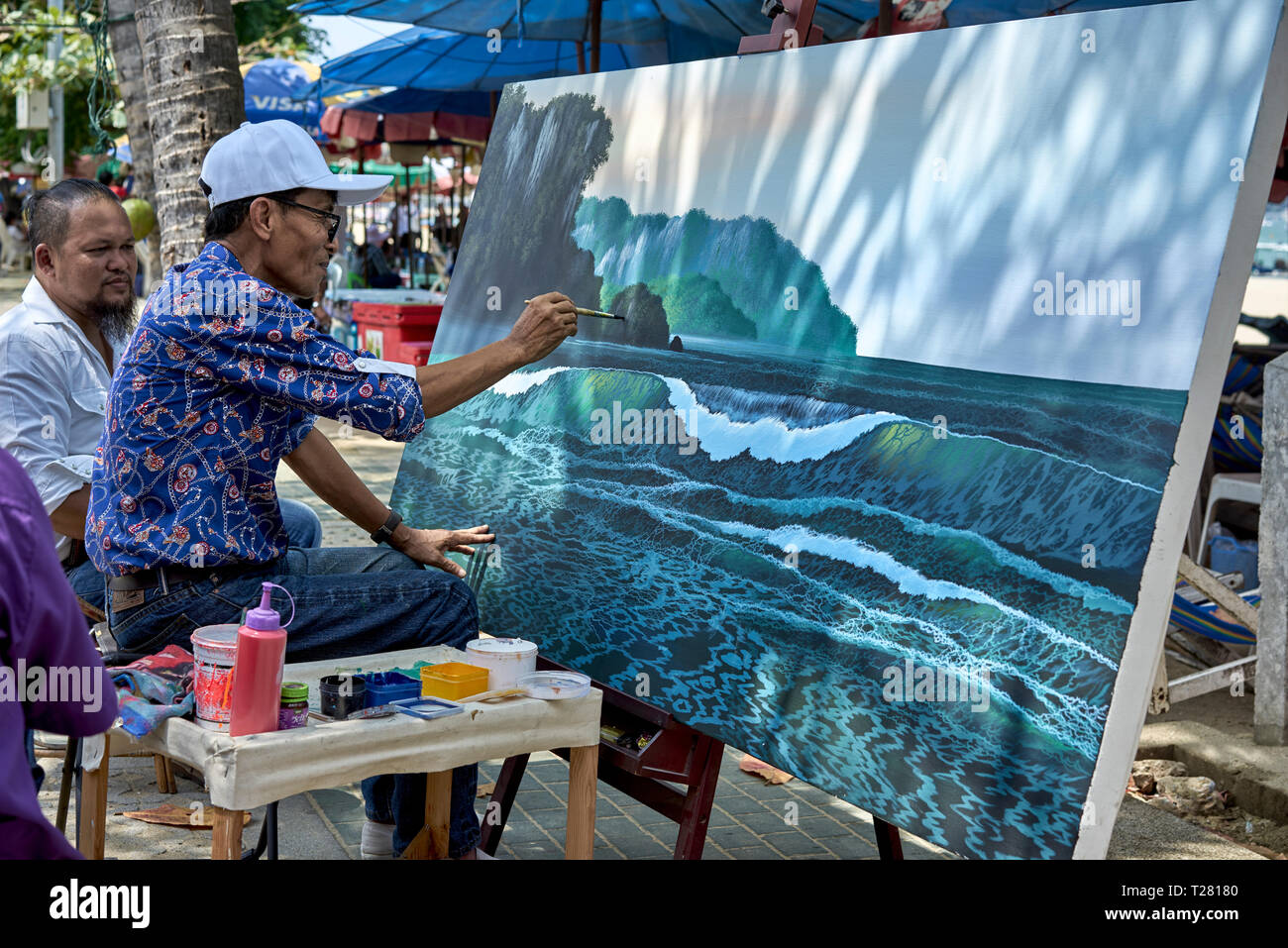 Artista dipingere il paesaggio tela all'esterno. Thailandia del sud-est asiatico Foto Stock