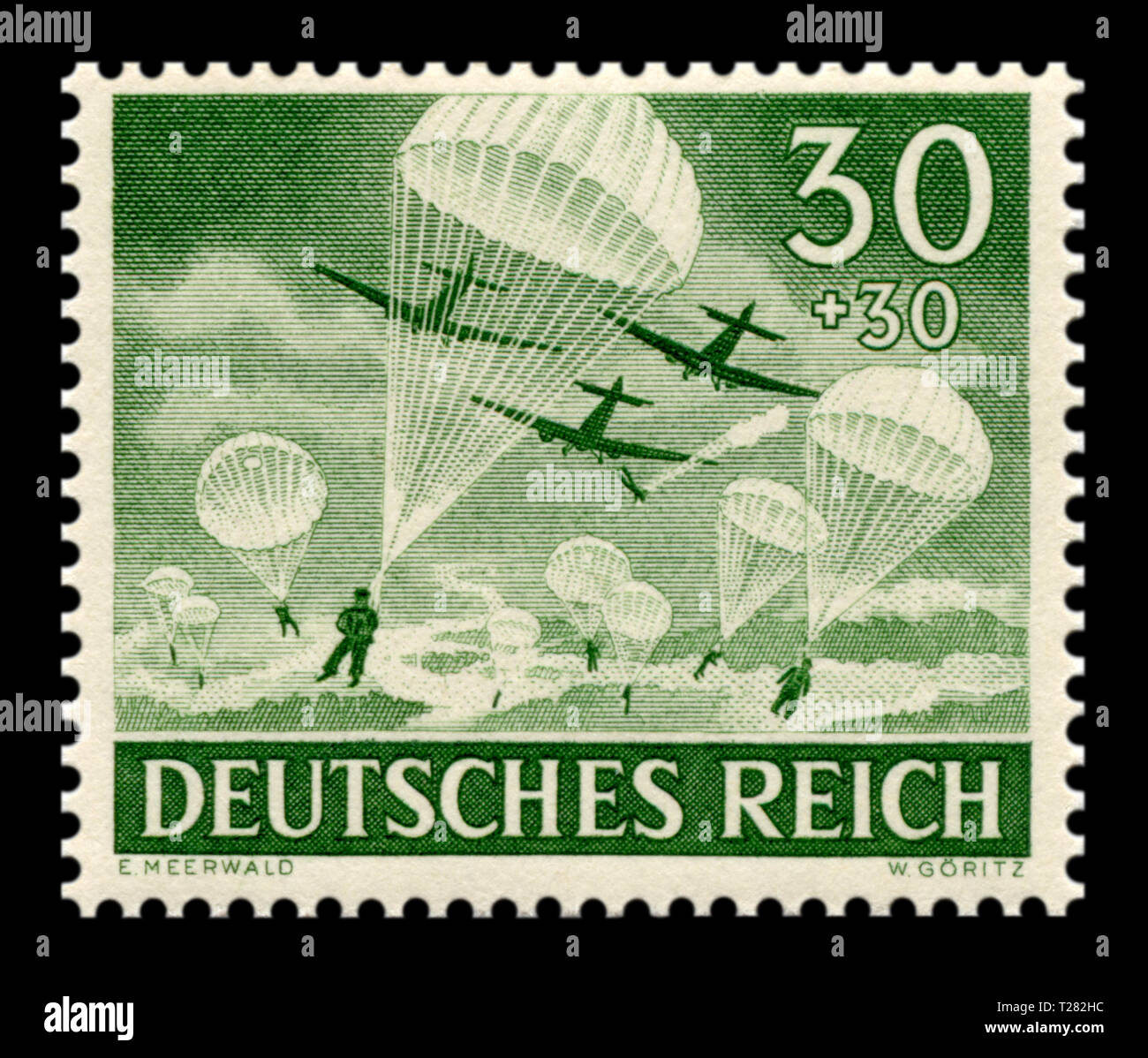 German Historical timbro: paracadutisti della Wehrmacht paracadute nel trasporto con aeromobile Junkers Ju 52 Giorno Memoriale della questione 1943, Germania, DR. Foto Stock