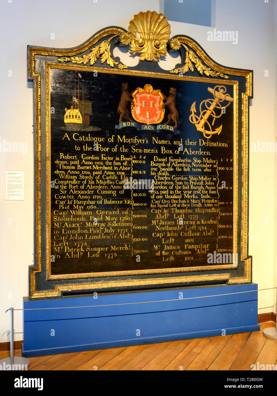 Una storica della scheda di informazioni sul display come una mostra che elenca un catalogo di Mortifer nell'Aberdeen Maritime Museum, Aberdeen Scotland, Regno Unito Foto Stock
