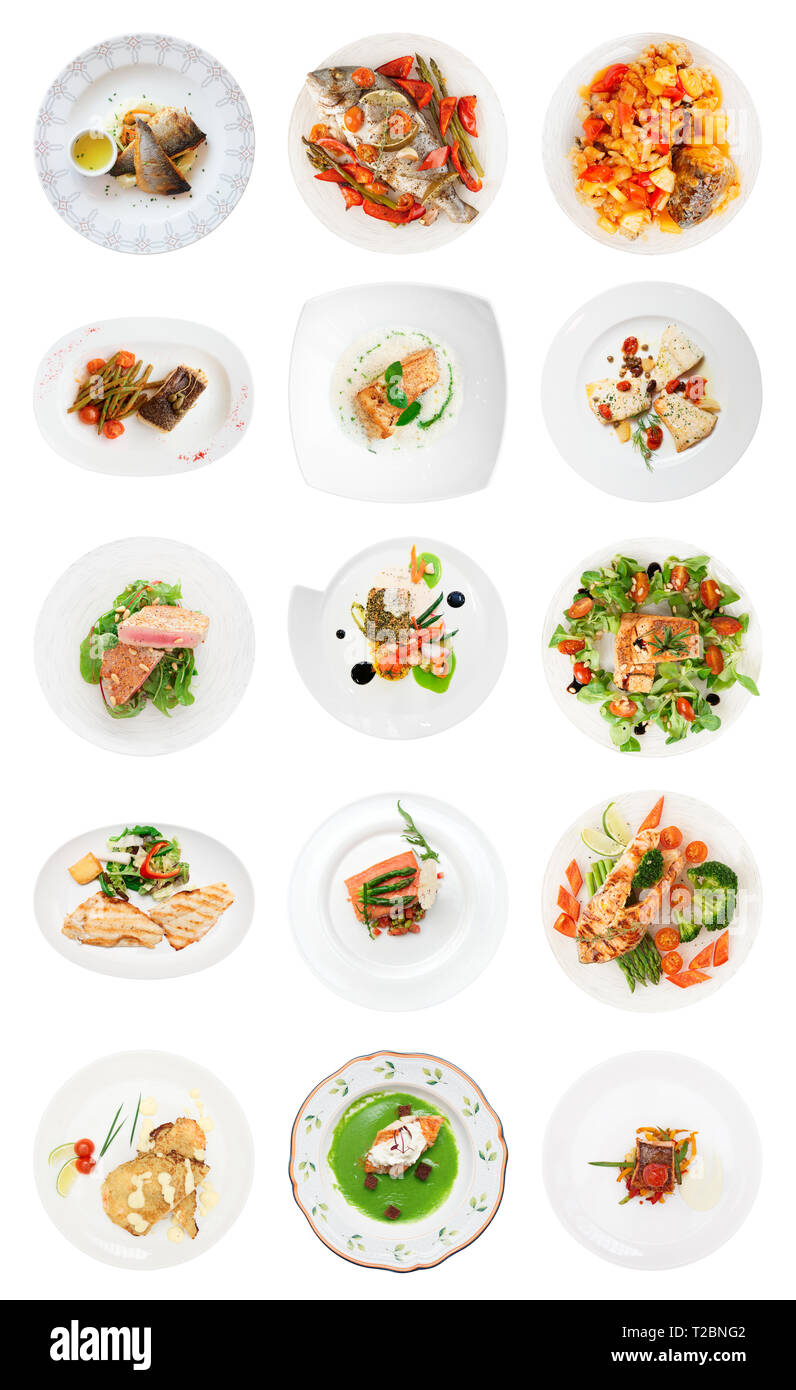 Set di vari piatti di pesce isolato su bianco, ripresa dall'alto Foto Stock