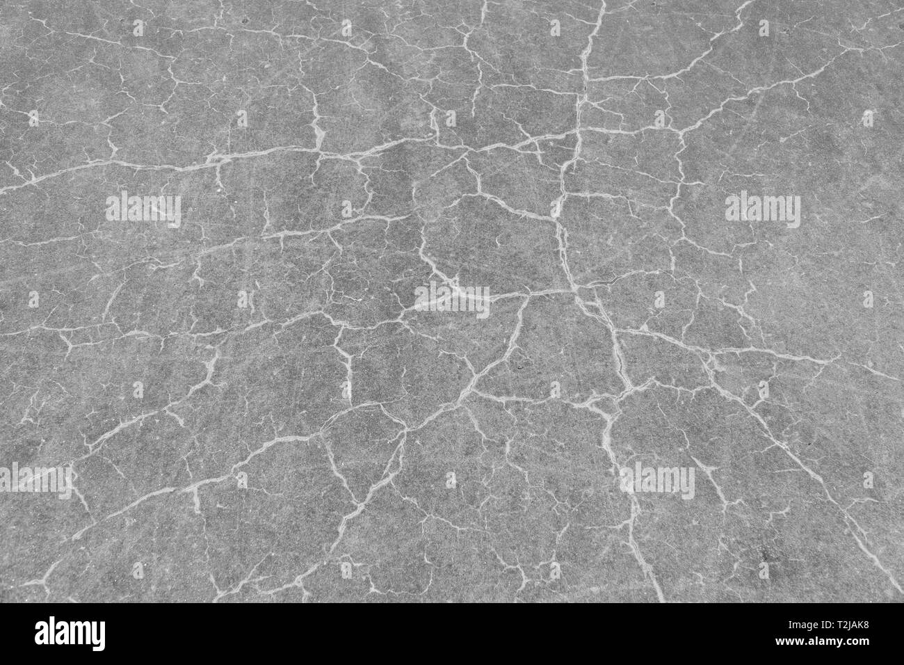 Calcestruzzo texture di sfondo. Sfondo grigio chiaro texture con cricche . Architettura Foto Stock