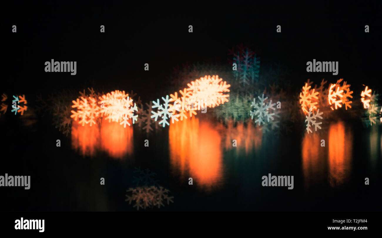 Bokeh snowflake grafica di sfondo Foto Stock