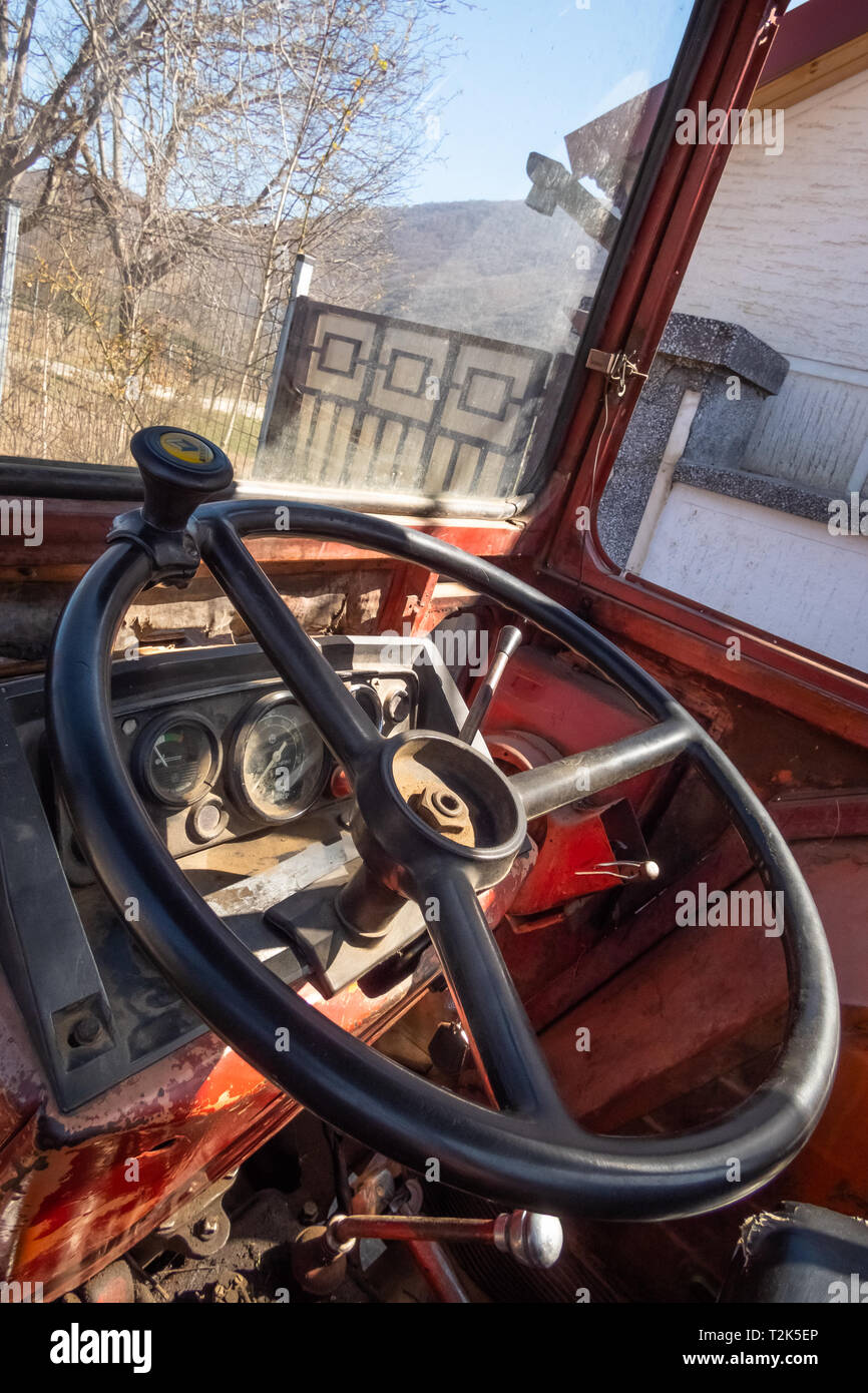 Il volante del trattore Foto Stock