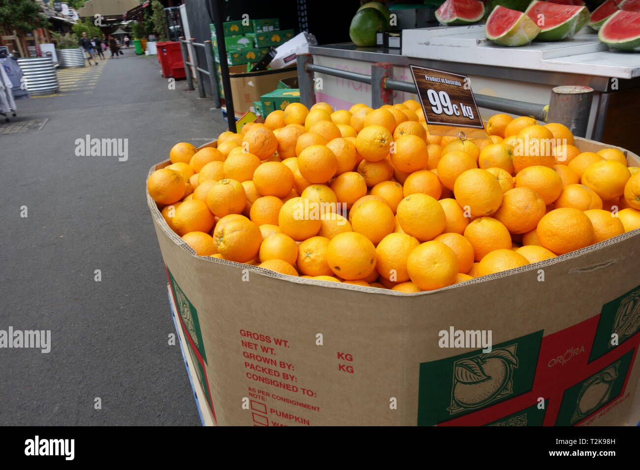 Freschi frutti di colore arancione al Queen Victoria Market di Melbourne Foto Stock