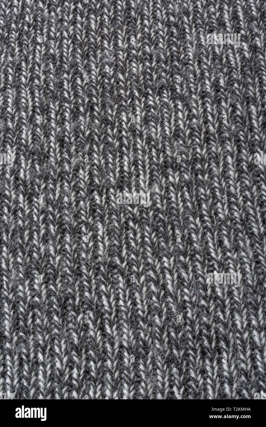 Close-up shot macro di poliestere tessuto tessuto. Metafora cucito in tempo, cucito, trama e ordito, industria tessile. Foto Stock
