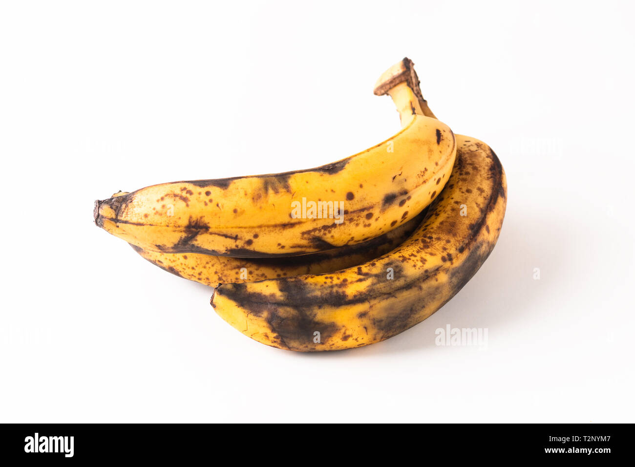 Concetto di alimentare lo stadio stramature di banane isolati su sfondo bianco Foto Stock