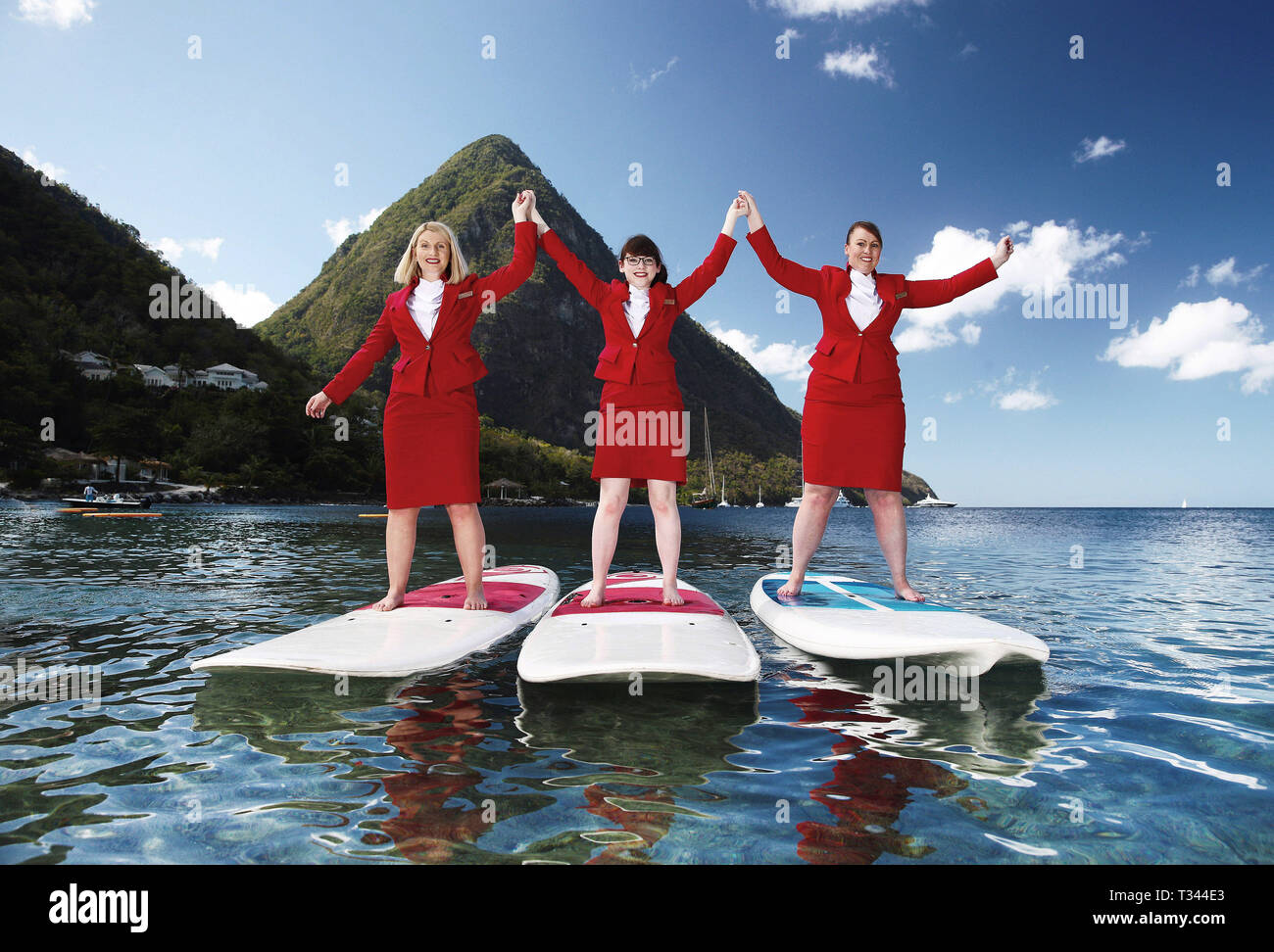 In vista della Giornata internazionale della donna venerdì 8 marzo, la Virgin Holidays brilla di una luce sul St Lucia - l'unico luogo al mondo ad essere chiamato dopo una donna, Saint Lucie - dando è omonimi in tutto il Regno Unito una libera possibilità di visita. Nella foto: Virgin Holidays consulenti di viaggio Lucia Messina (età 31), Lucy McManus (età 23), Lucy Hudson (età 31) nel loro paese omonimo, St Lucia, per lanciare la campagna in vista della Giornata internazionale della donna. Dotato di: Lucy Hudson, Lucia Messina, Lucy McManus dove: Saint Lucia quando: 22 Feb 2019 Credit: Joe Pepler/PinPep/WENN.com Foto Stock