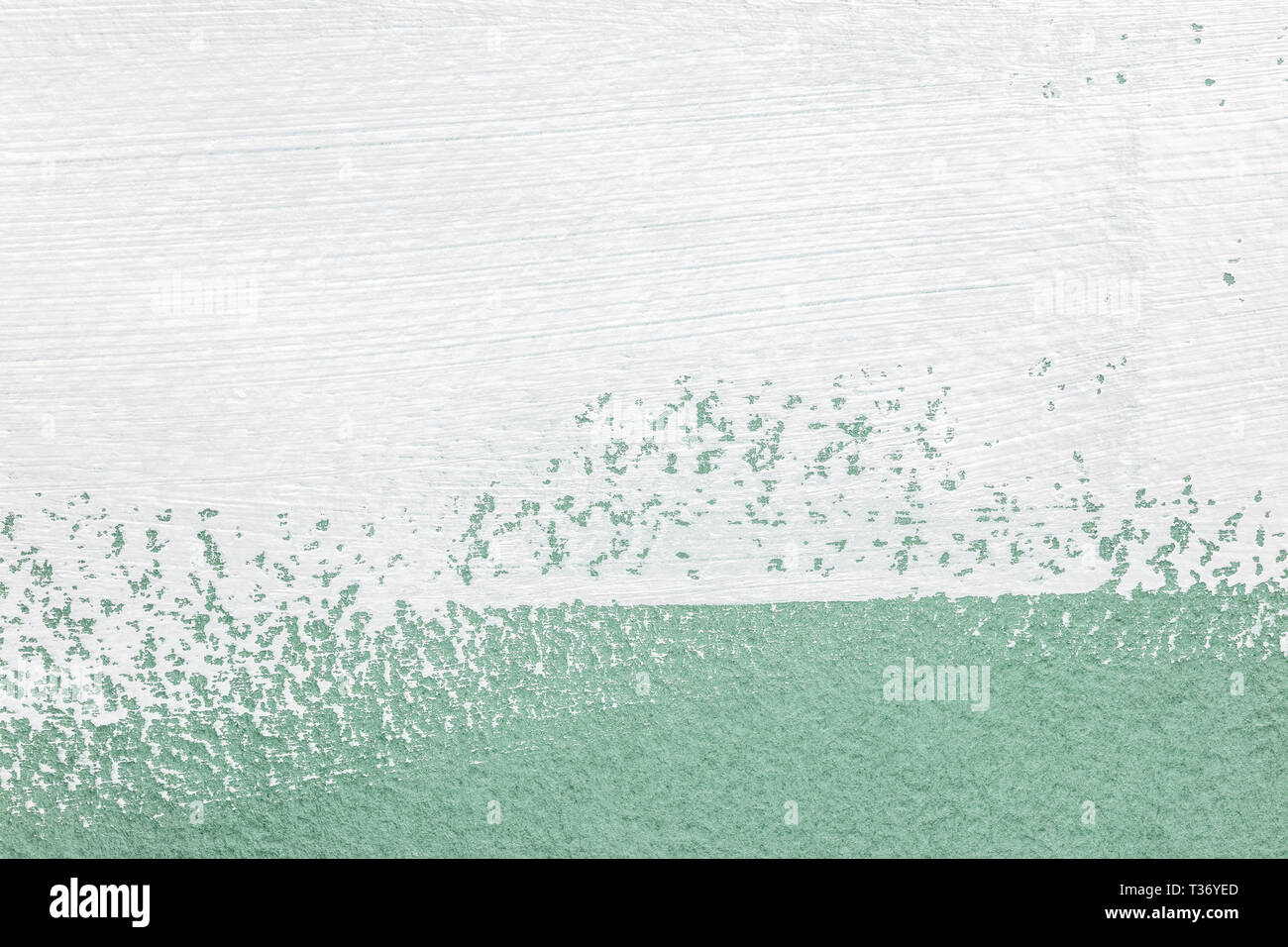 White pennellate su sfondo verde chiaro. alta texture dettagliate Foto Stock