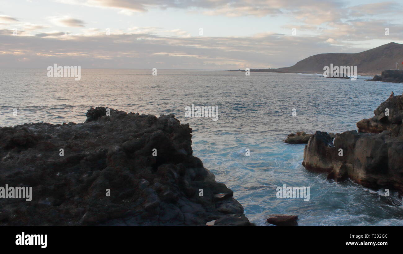 Atardecer en playa de gran canaria. Tramonto in Gran Canaria spiaggia. Foto Stock