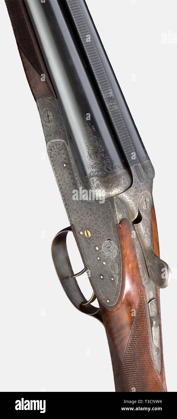 Una splendida da lato a lato, shotgun Martin Kruschitz jun. in Vienna, circa 1973, 12/70 cal., n. 25.2181. Simili a specchio alesaggi, solo più minimale segni di utilizzo, finitura sottile in luoghi, scritto: 'BÖHLER RASANT' e in oro sul controfiletto lavorata 'M. KRUSCHITZ-Wien", 1973 Vienna prova mark, choke 3/4, 1/1, cordone bianco occhi, lunghezza 67,5 cm. Bullone più ecologici con doppio cilindro di bloccaggio a gancio, real serrature laterali à la Holland & Holland dorato con leve di armamento, colpendo pezzi, trigger e barre di cattura, dorate a doppio grilletto, articolata trigger anteriore, far scorrere la sicurezza su sma, Additional-Rights-Clearance-Info-Not-Available Foto Stock