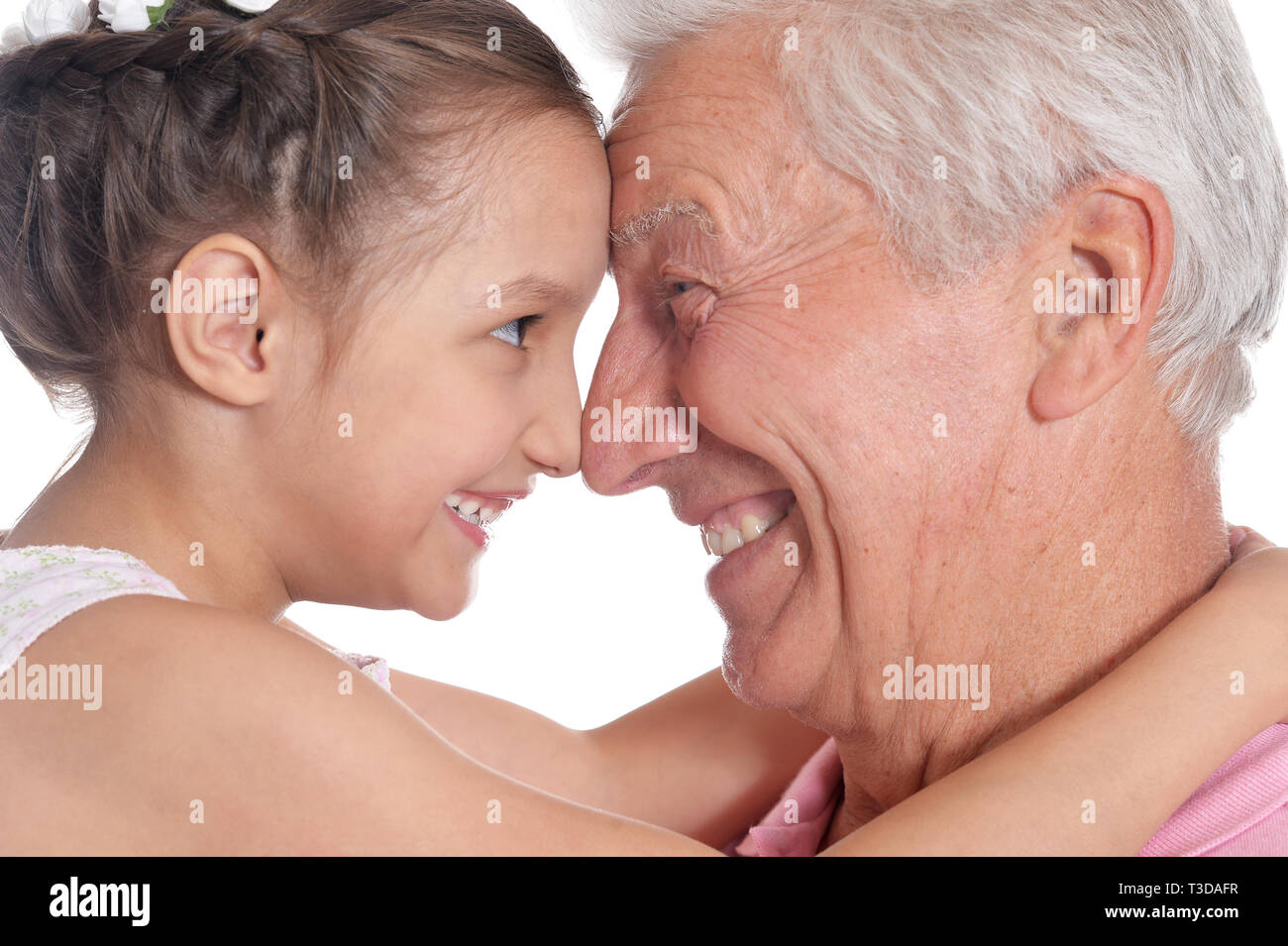 Ritratto di felice uomo anziano con graziosi nipote Foto Stock