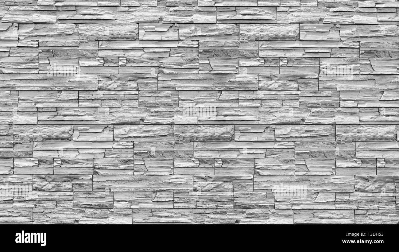 Abstract weathered texture colorate vecchio stucco grigio chiaro e di età compresa la vernice bianco muro di mattoni di sfondo nella camera rurale, grungy rusty blocchi di pietra te Foto Stock
