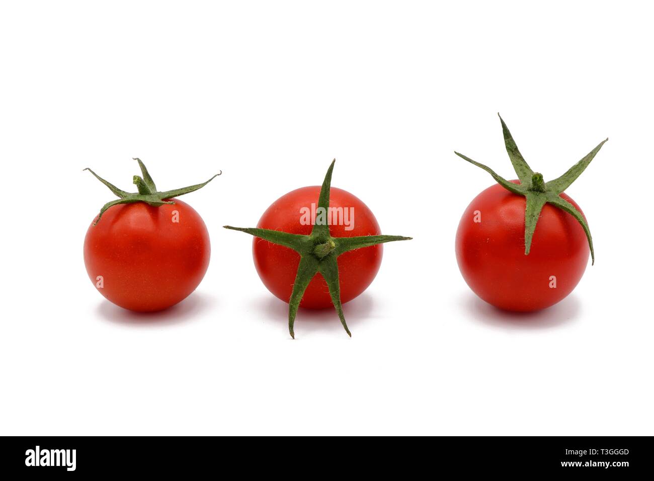Cocktail - pomodori rossi freschi pomodori cocktail isolati su sfondo bianco Foto Stock