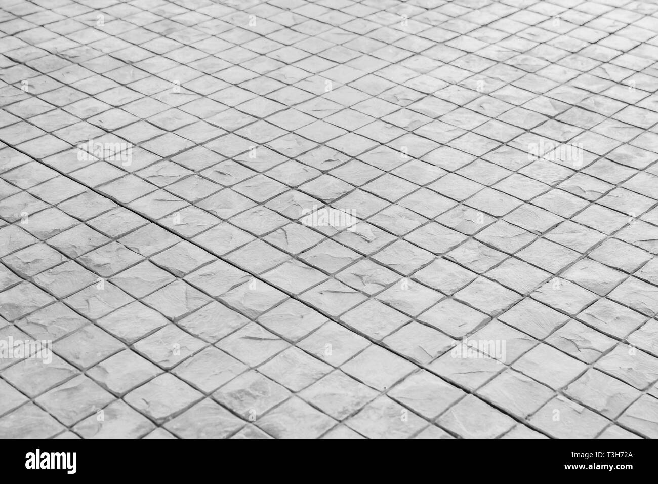 In bianco e nero del pavimento in pietra texture di sfondo Foto Stock