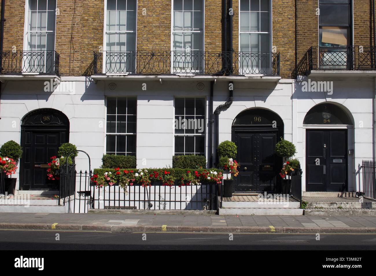 Facciate di case gentrified a Londra Foto Stock