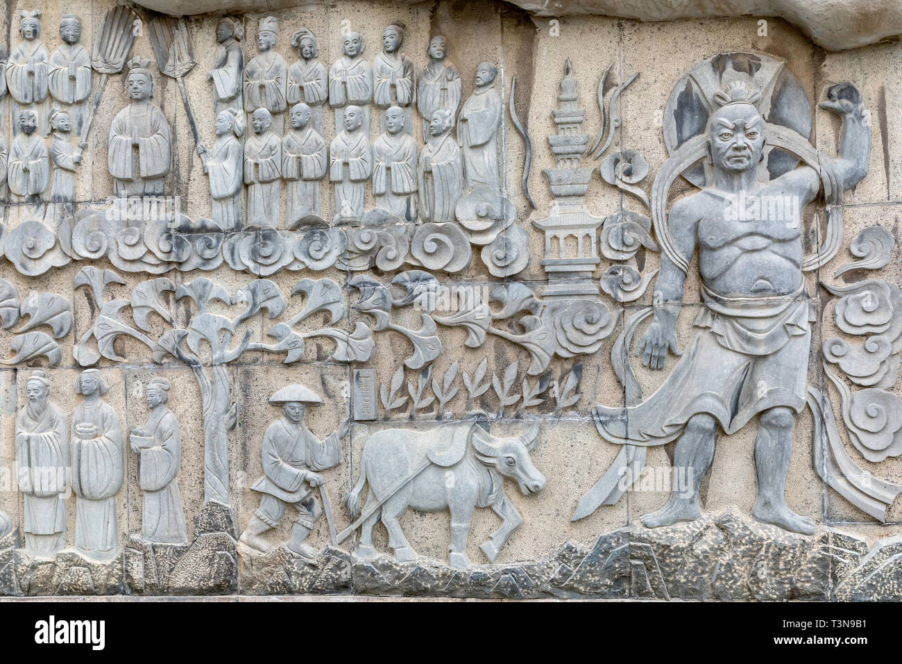 Bassorilievo in pietra, mille Buddha Mountain, Jinan, provincia di Shandong, Cina Foto Stock