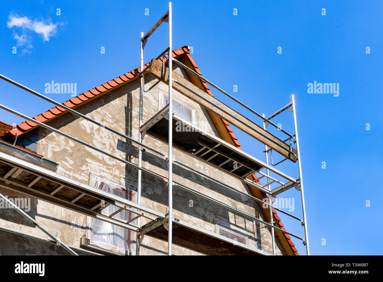 Impalcatura su una casa residenziale Foto Stock