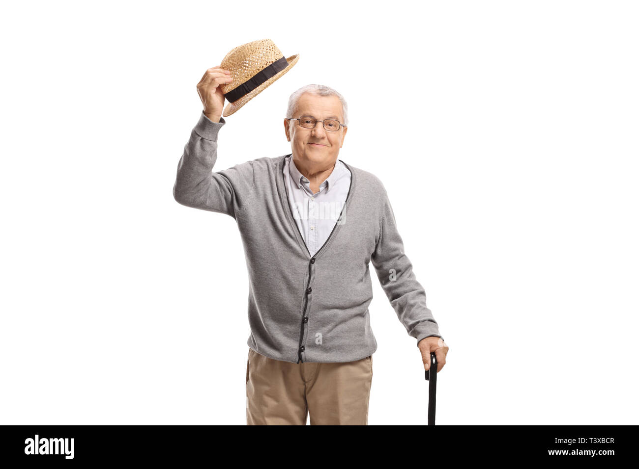 Senior uomo messaggio di saluto con il suo cappello isolati su sfondo bianco Foto Stock
