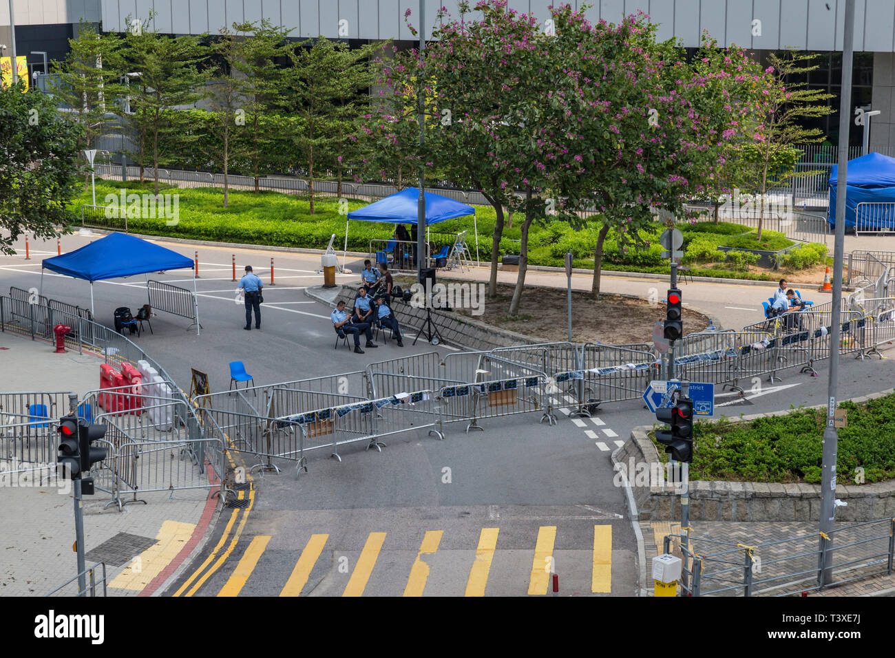 Hong Kong Ombrello giallo proteste vide strade principale bloccato contro il traffico chiudendo intere sezioni dei quartieri centrali degli affari. Foto Stock