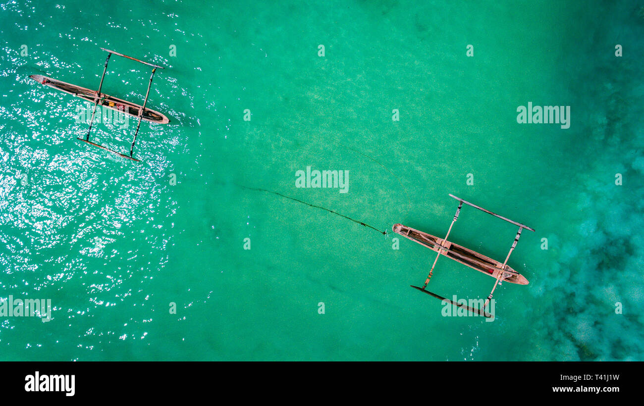 Di pescatori in dhow stone town Zanzibar Foto Stock