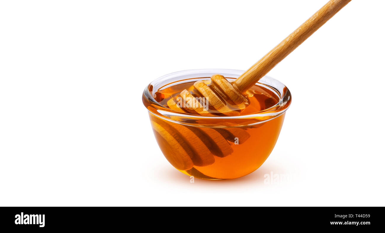 La bacchetta di miele e una ciotola di miele isolato su sfondo bianco con tracciato di ritaglio Foto Stock