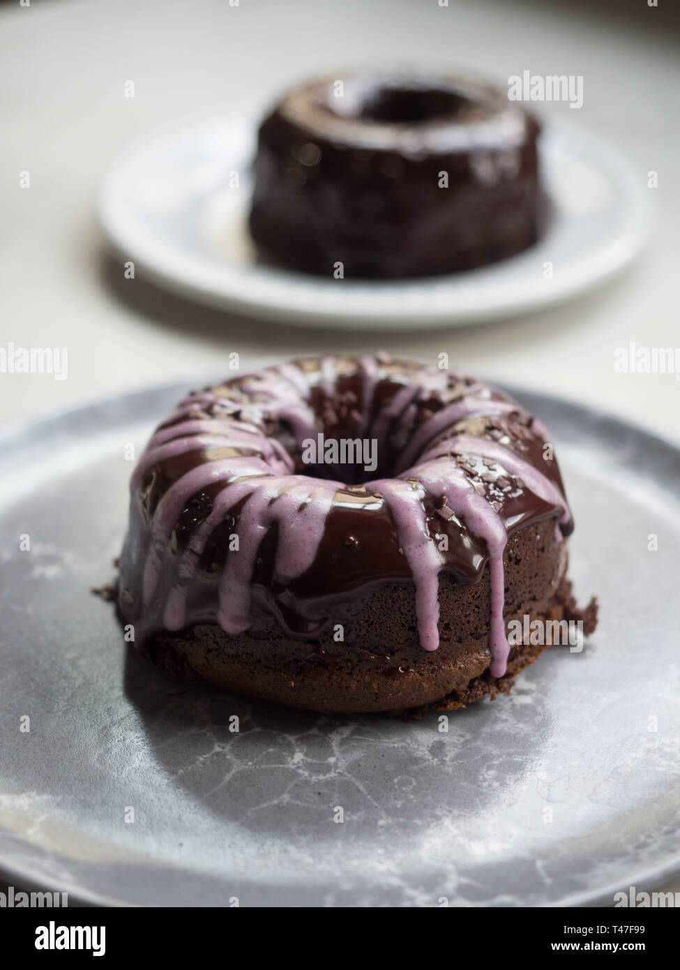 Ciambelle al cioccolato senza glutine Foto Stock