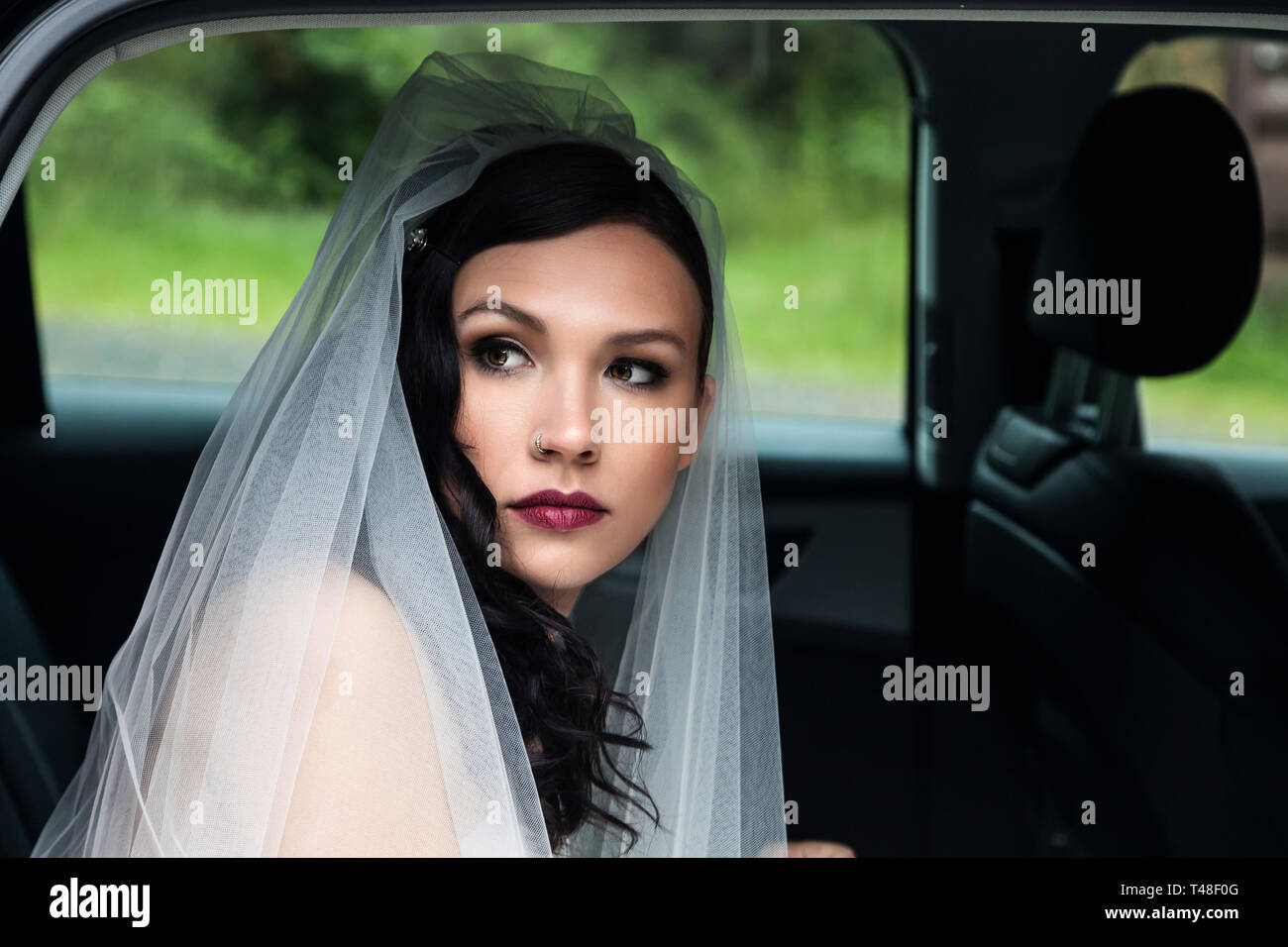 Sposa in un matrimonio auto Foto Stock