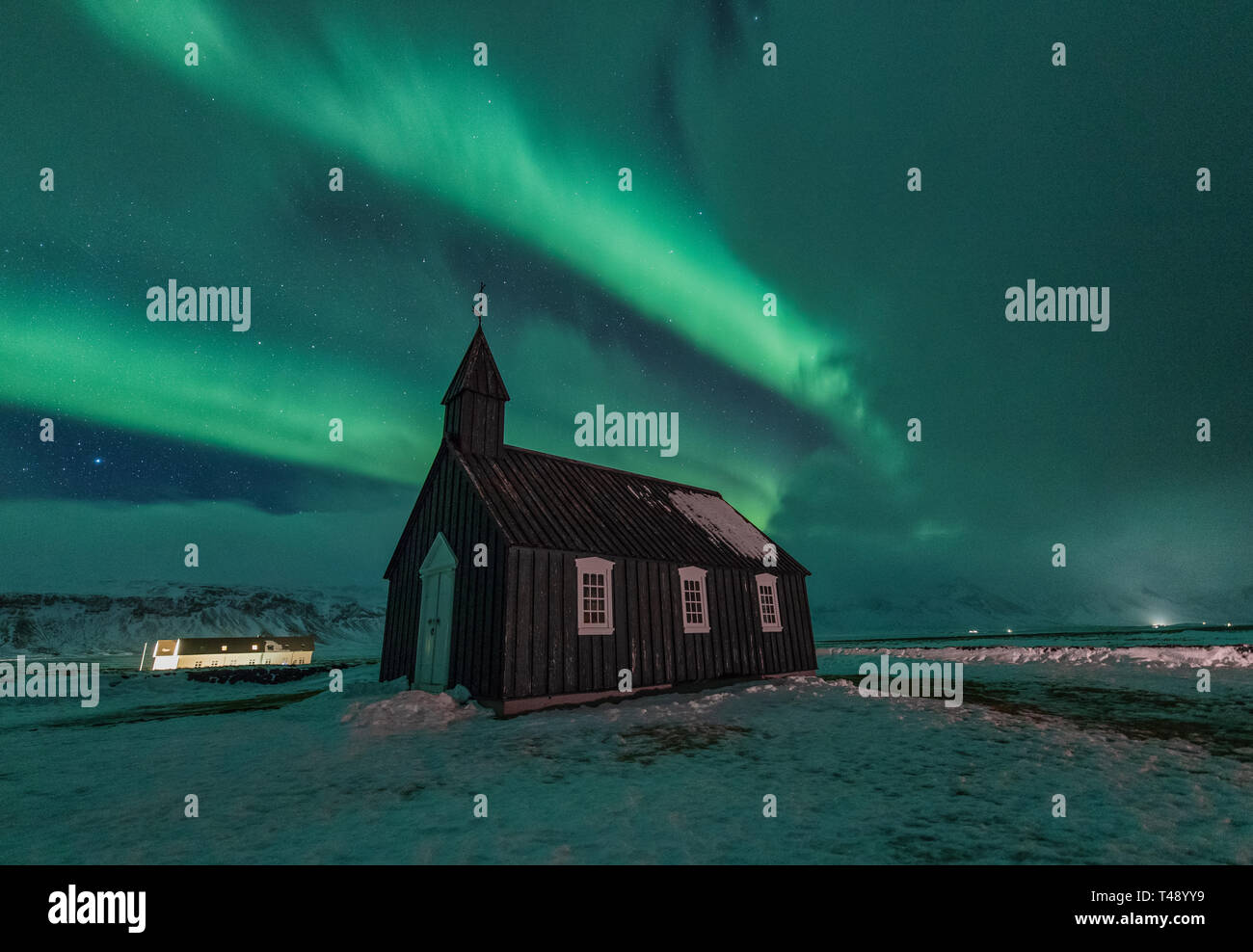 Aurora Boreale su Chiesa Budir Islanda Foto Stock