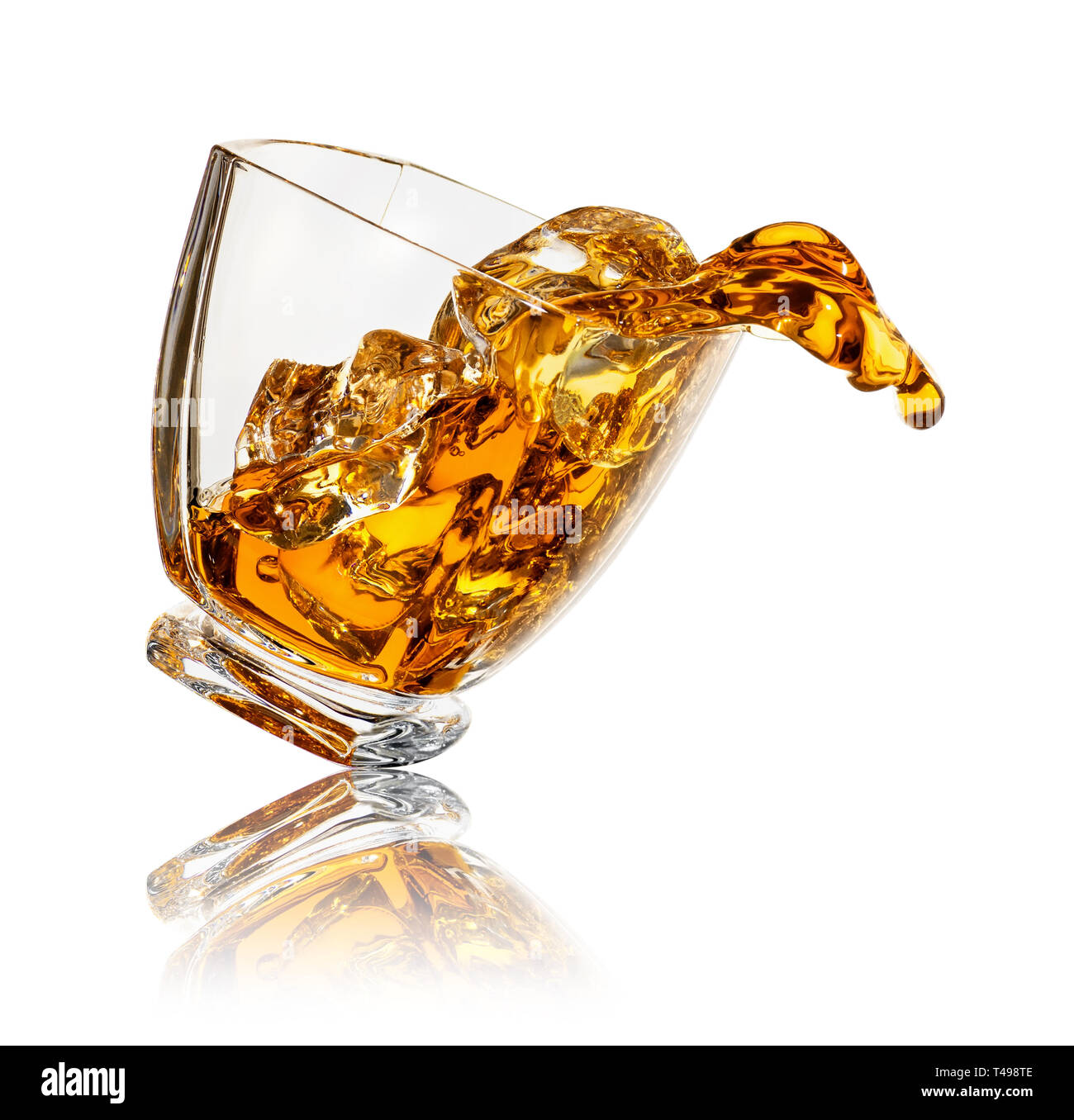 Splash di whiskey in vetro Foto Stock