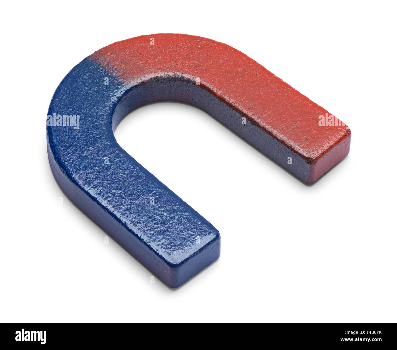 Piccolo Ferro di Cavallo magnete isolato su bianco. Foto Stock