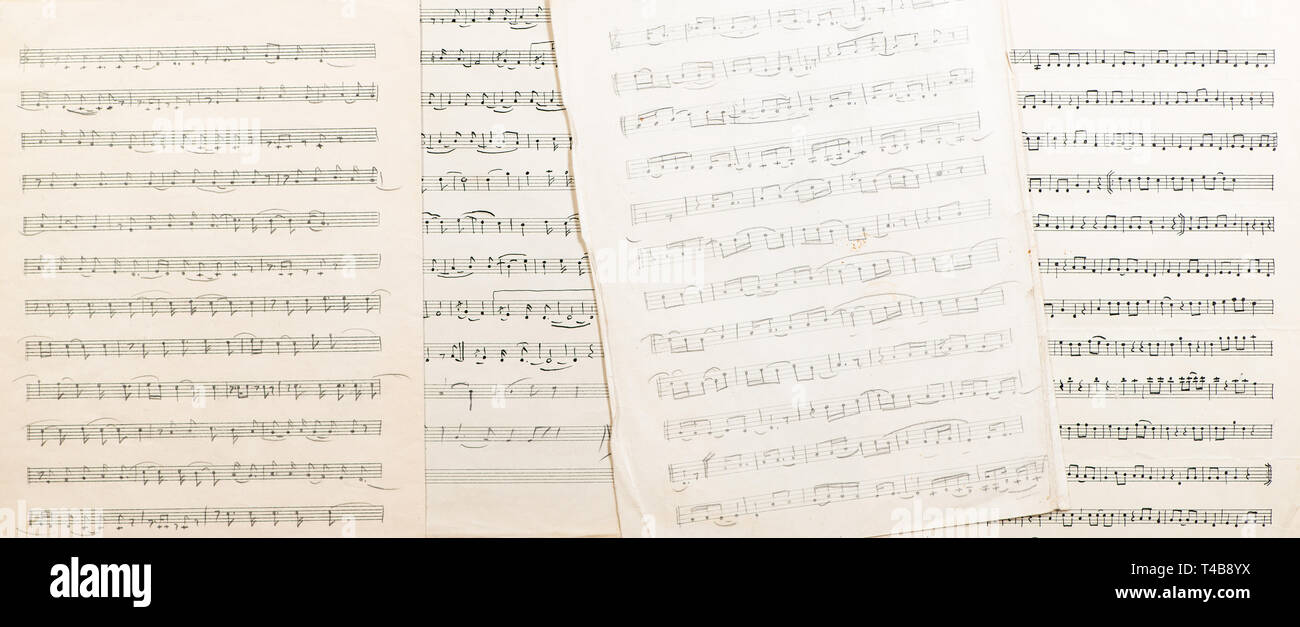 Vintage foglio di carta con la scritta a mano le note musicali Foto Stock