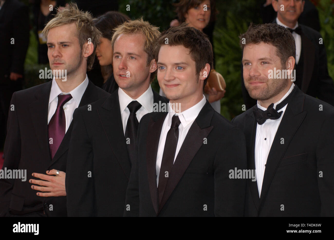 LOS ANGELES, CA. Febbraio 29, 2004: Dominic Monaghan (sinistra), Billy BOYD, Elia Legno & sean astin al 76th annuale di Academy Awards di Hollywood. Foto Stock