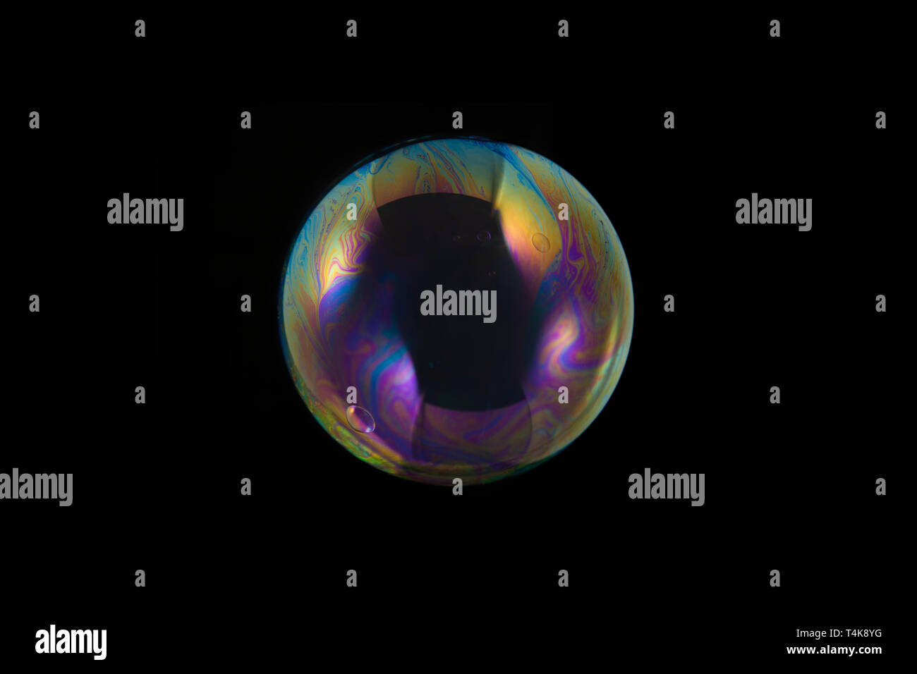 Bolle di zuppa isolati su sfondo nero Foto Stock