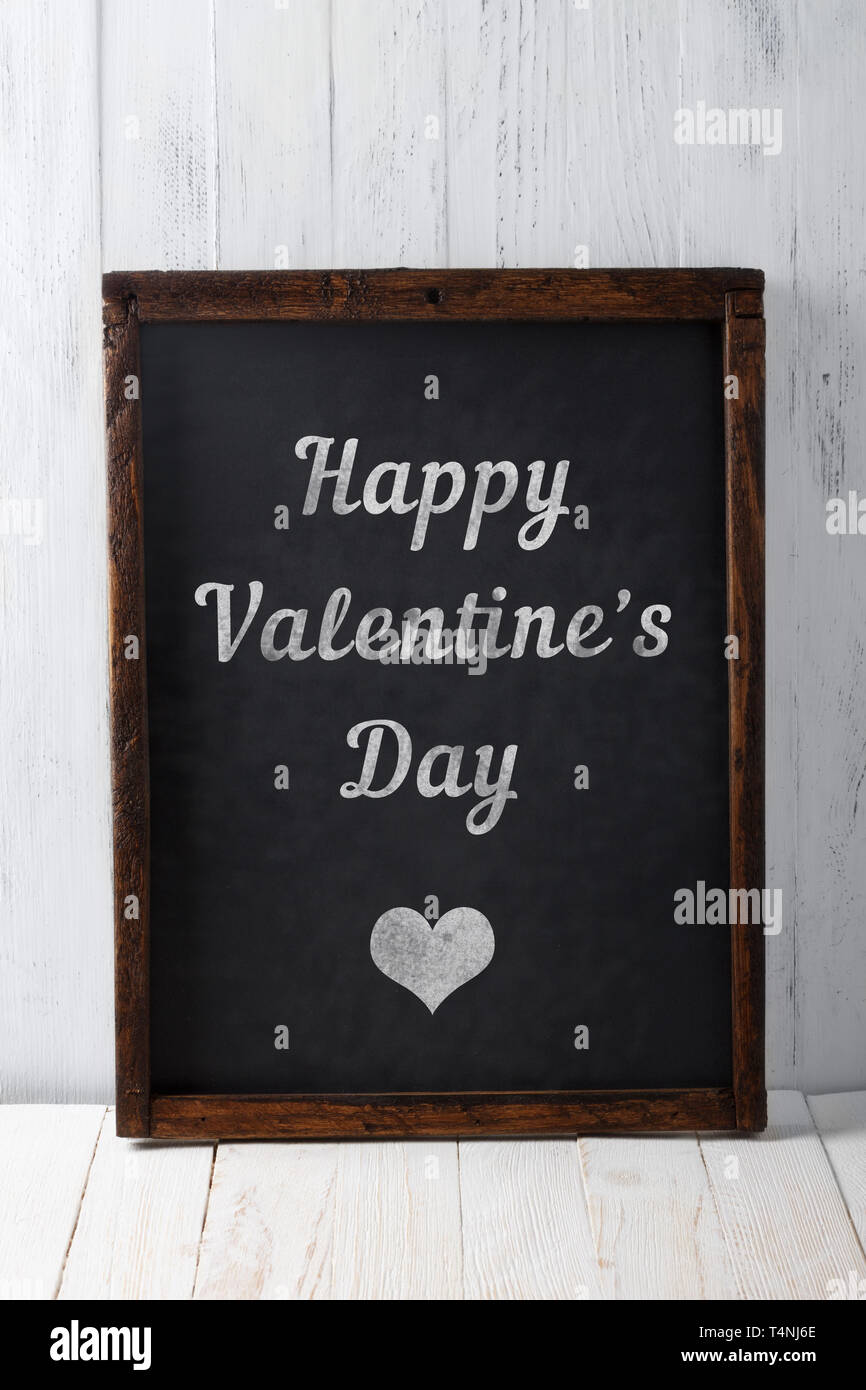 Felice il giorno di San Valentino il testo su vintage lavagna vuota Foto Stock