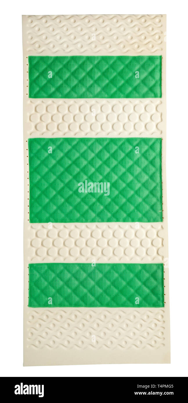 Lattice di gomma naturale materasso con zone di supporto in alternato verde e bianco per il massimo supporto ed elasticità è vista dal di sopra che giace piatto su whi Foto Stock