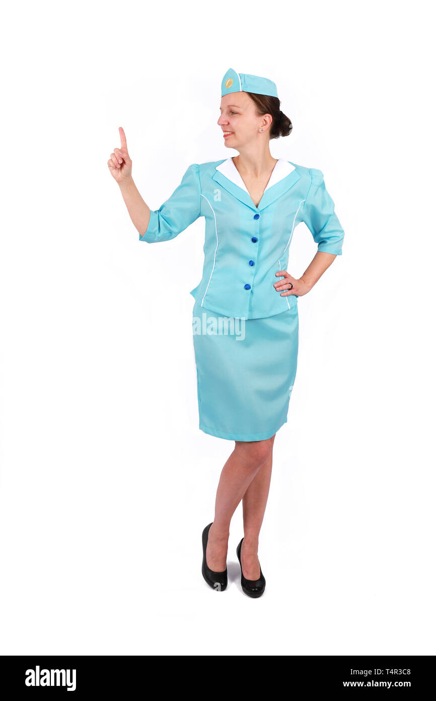 Stewardesse - Ritratto di affascinanti e sorridenti hostess che indossa in uniforme blu. Isolato su sfondo bianco Foto Stock