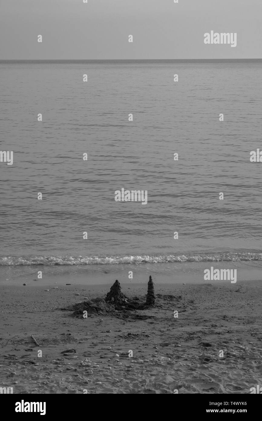Sabbia e mare Foto Stock