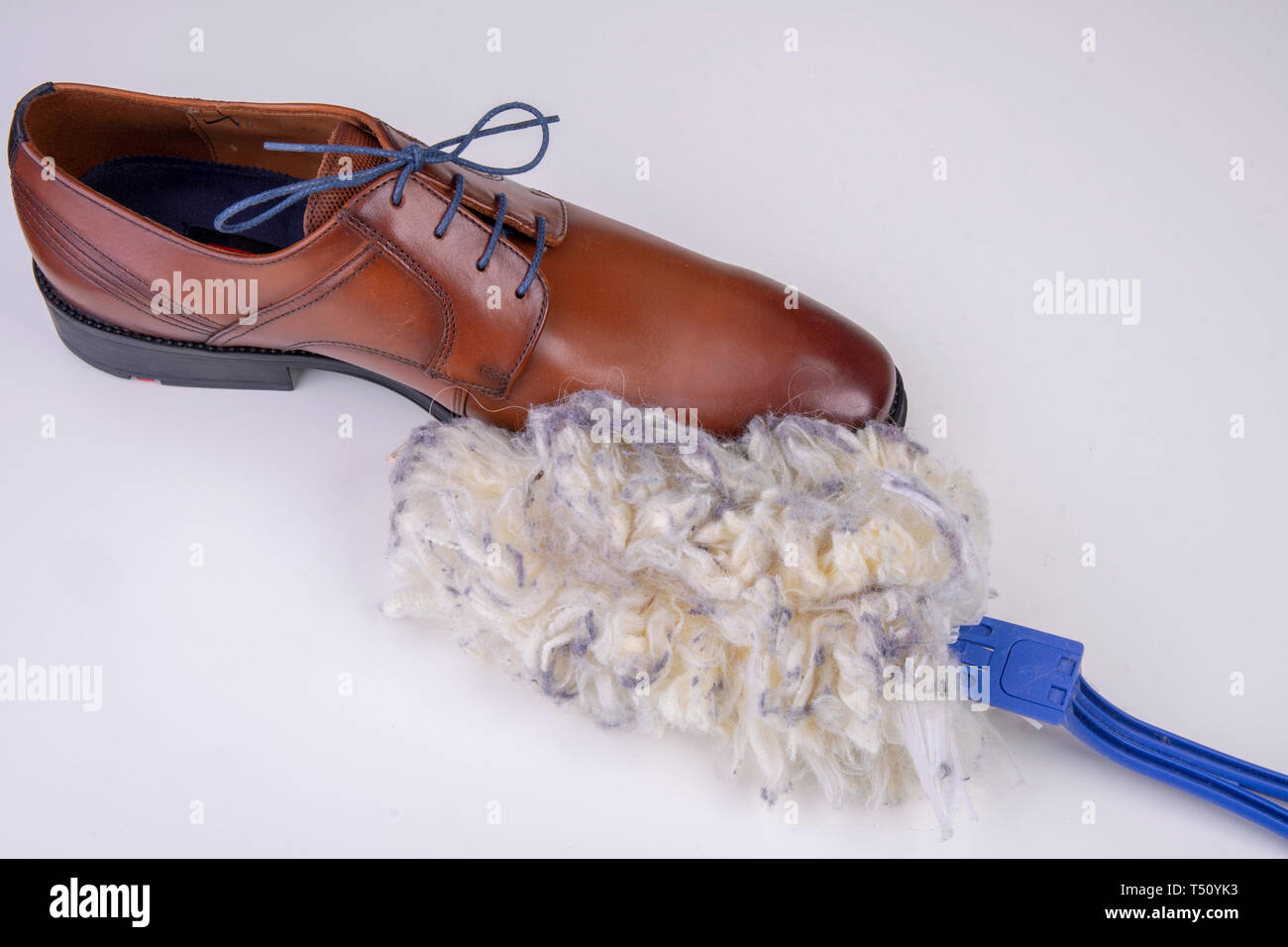 Duster sporca di marrone scarpa di business Foto Stock