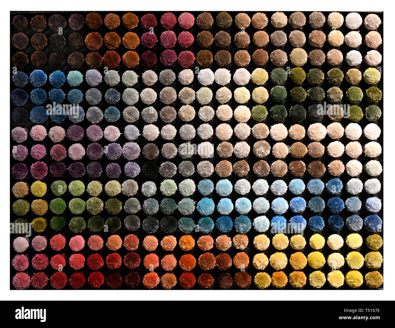 Tettuccio di texture di sfondo multicolore di spessa pila vellutata in moquette prodotti tessili formanti una circolare texture di sfondo e modello Foto Stock