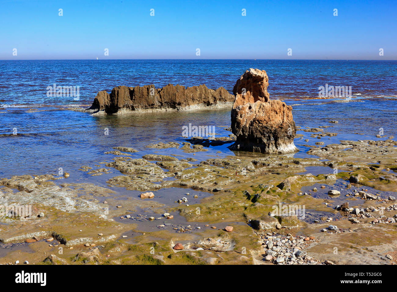 La caletta rocciosa a Los Arenetes in San Antonio riserva marina, Les Rotes, Denia, Spagna Foto Stock