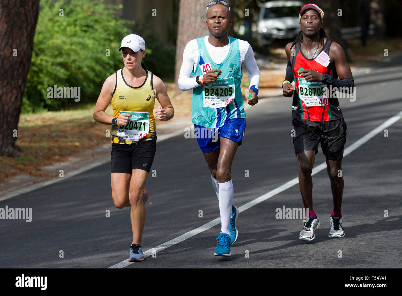 Eseguendo la Old Mutual Two Oceans Marathon Foto Stock