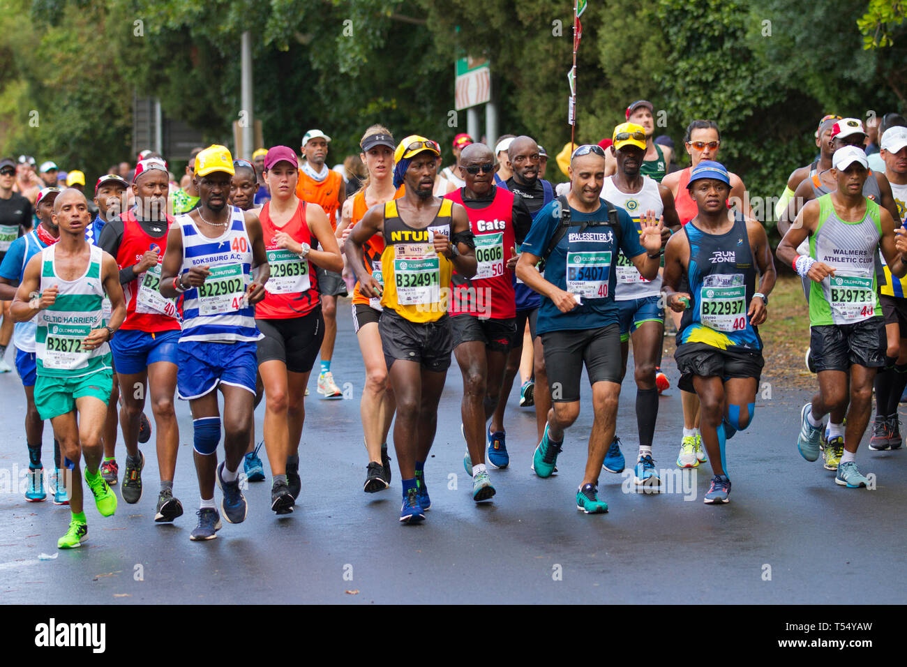 Eseguendo la Old Mutual Two Oceans Marathon Foto Stock