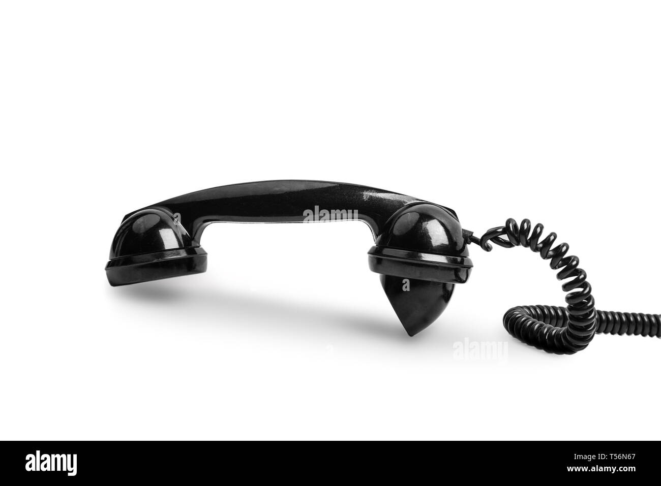 Vecchio nero ricevitore telefono isolato su sfondo bianco con tracciato di ritaglio Foto Stock