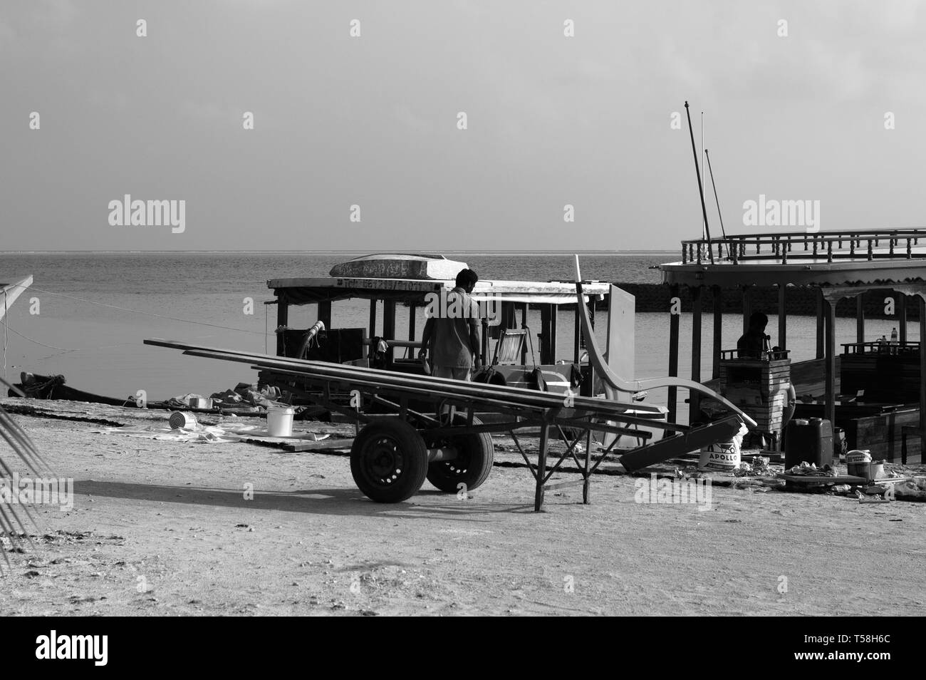 I lavoratori del porto (atollo di Ari, Maldive) Foto Stock