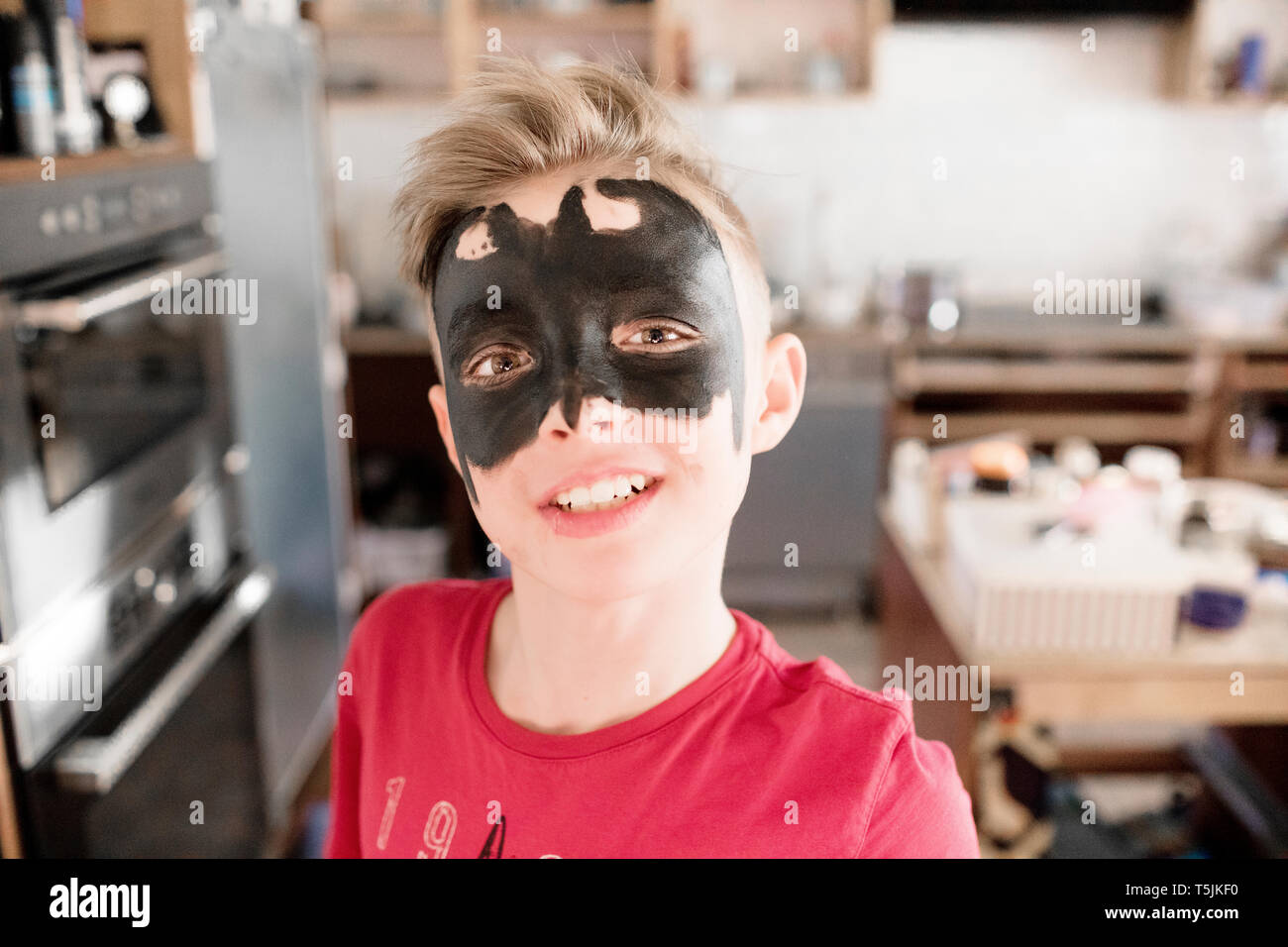 Ragazzo confezionati come batman Foto Stock