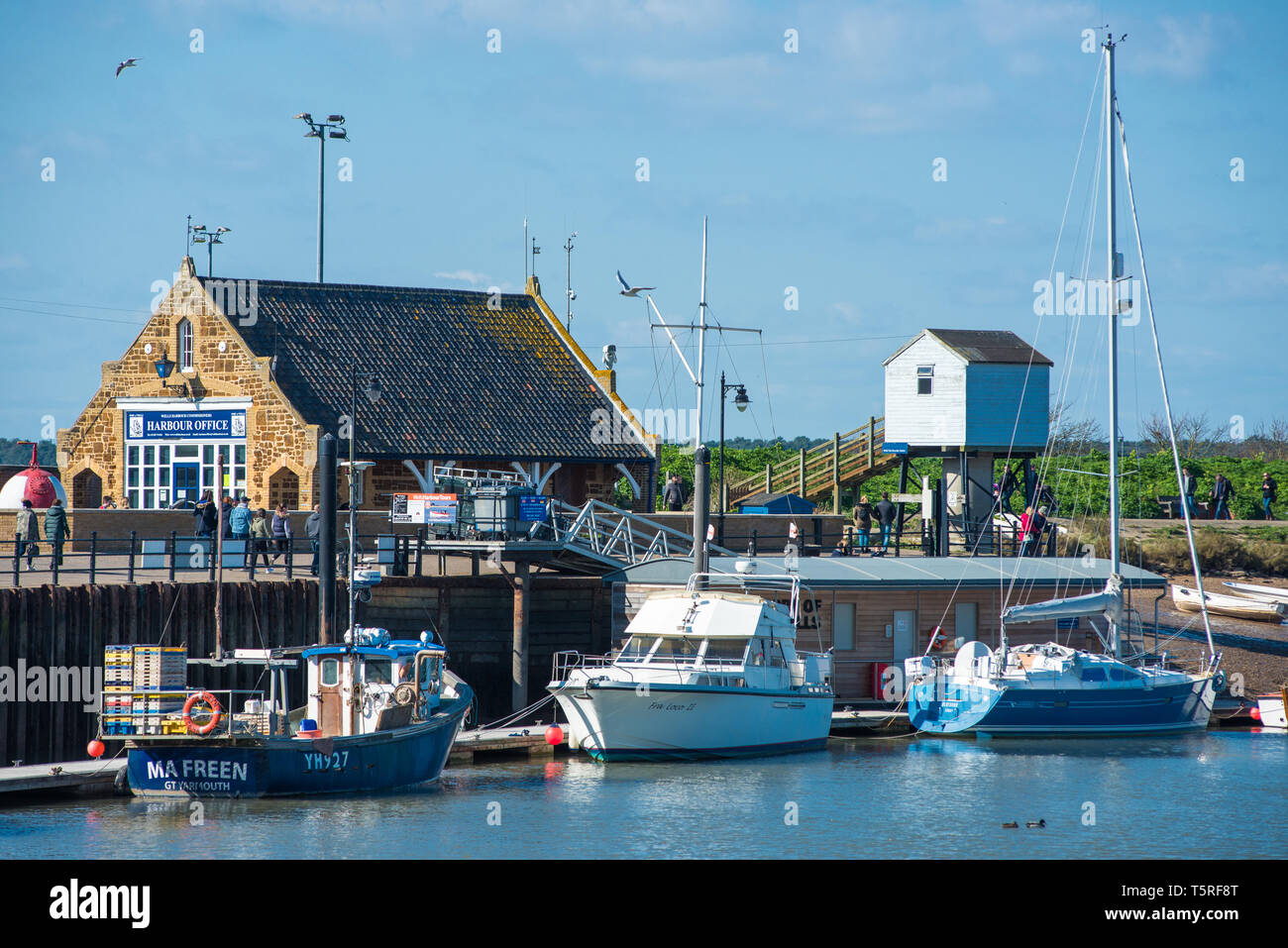 Pozzetti accanto al mare, porto Office, Norfolk, Inghilterra, Regno Unito, Inglese del Mare del Nord porta costiera e resort. Foto Stock