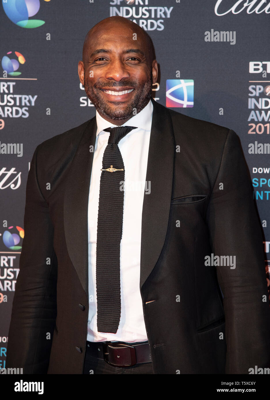 Londra, Inghilterra - 25 aprile: Johnny Nelson appare sul tappeto rosso davanti al BT Sport Industry Awards 2019 a Battersea Evolution il 25 Aprile, 201 Foto Stock